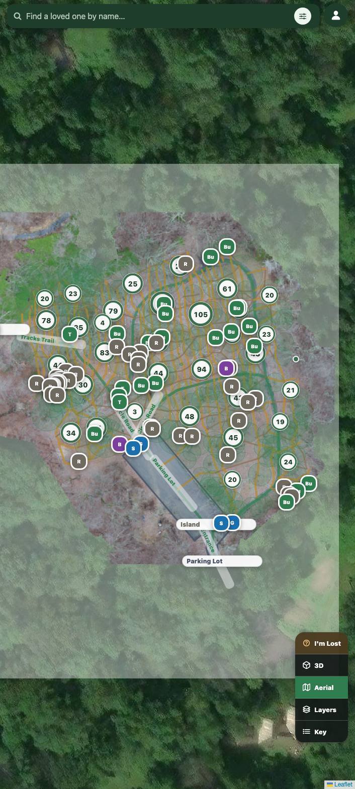 An aerial cemetery map where groups of graves are drawn as numbered circles rather than separate dots